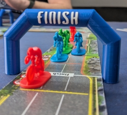 Flamme Rouge – Einfahrt ins Ziel